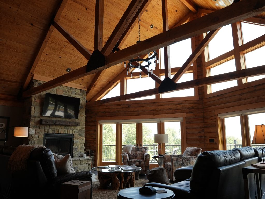 Log home living room ceiling with furniture