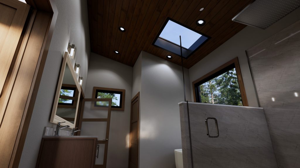Modern bathroom featuring a wood-paneled ceiling with a skylight, large windows overlooking trees, a stone-look glass-enclosed shower, and a wood vanity with a large illuminated mirror.