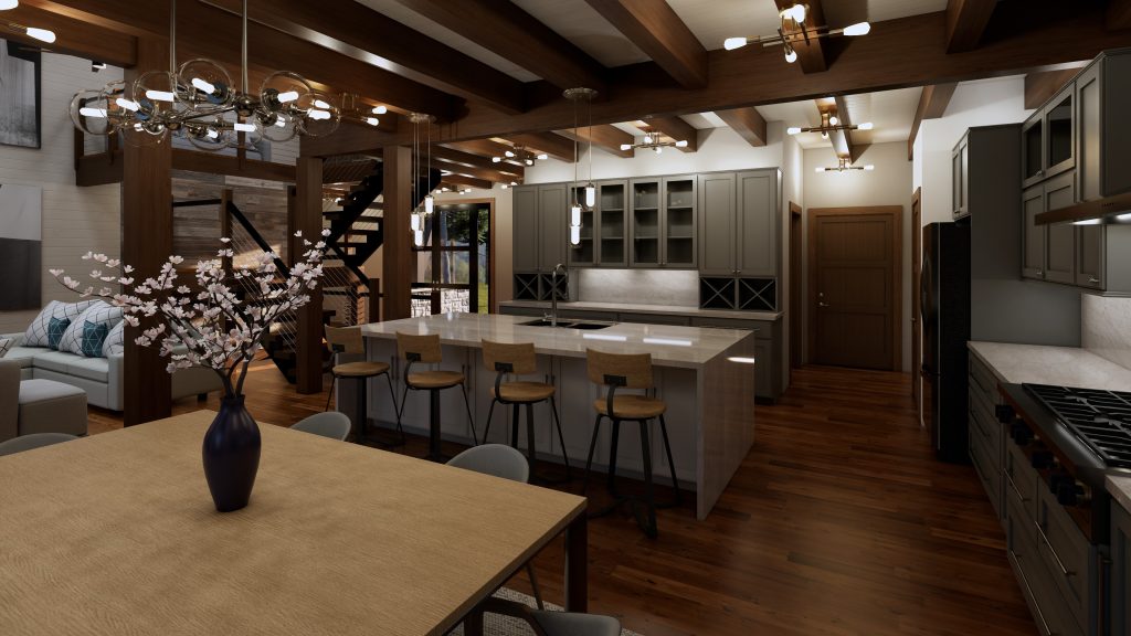 Open-plan mountain home interior featuring a large kitchen island with bar stools, dark gray cabinetry, warm wood beams and flooring, a dining table with a flowering branch centerpiece, and a contemporary staircase leading to an upper level.